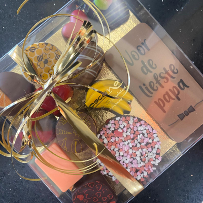 Voor de liefste papa: reep met bonbons. Voor de liefste papa: reep met bonbons.